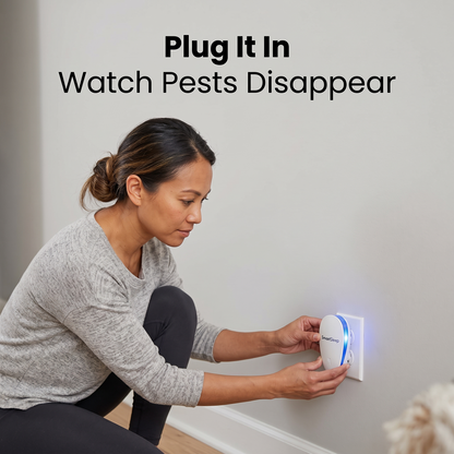 Person plugging a PestPro ultrasonic pest repeller into a wall outlet