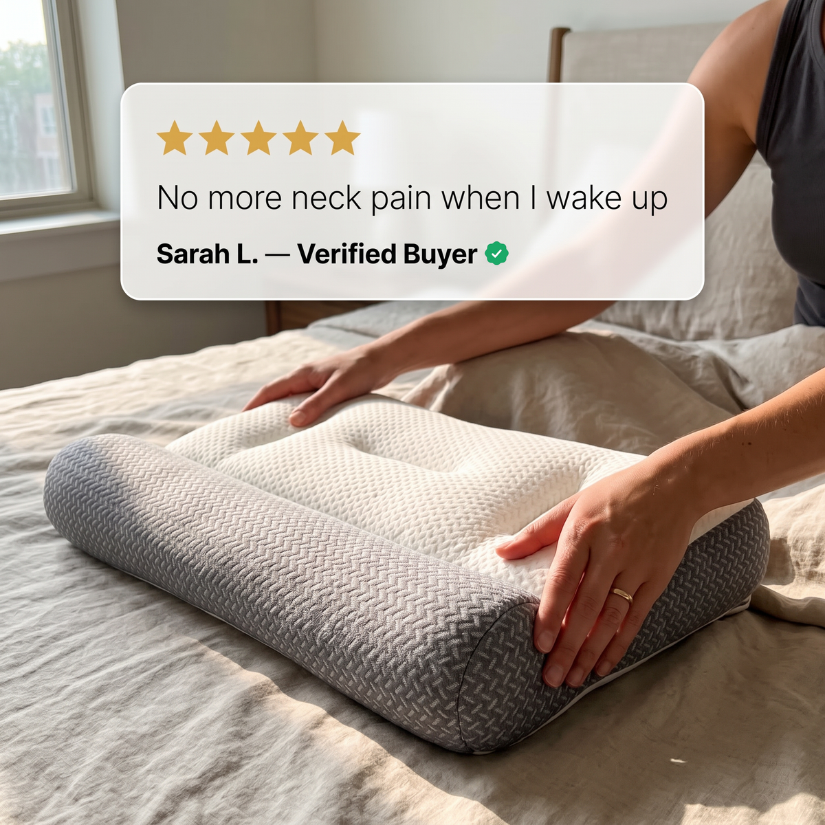 Hands smoothing a Sweet Sleep Cervical Contour Pillow on a bed with a customer review